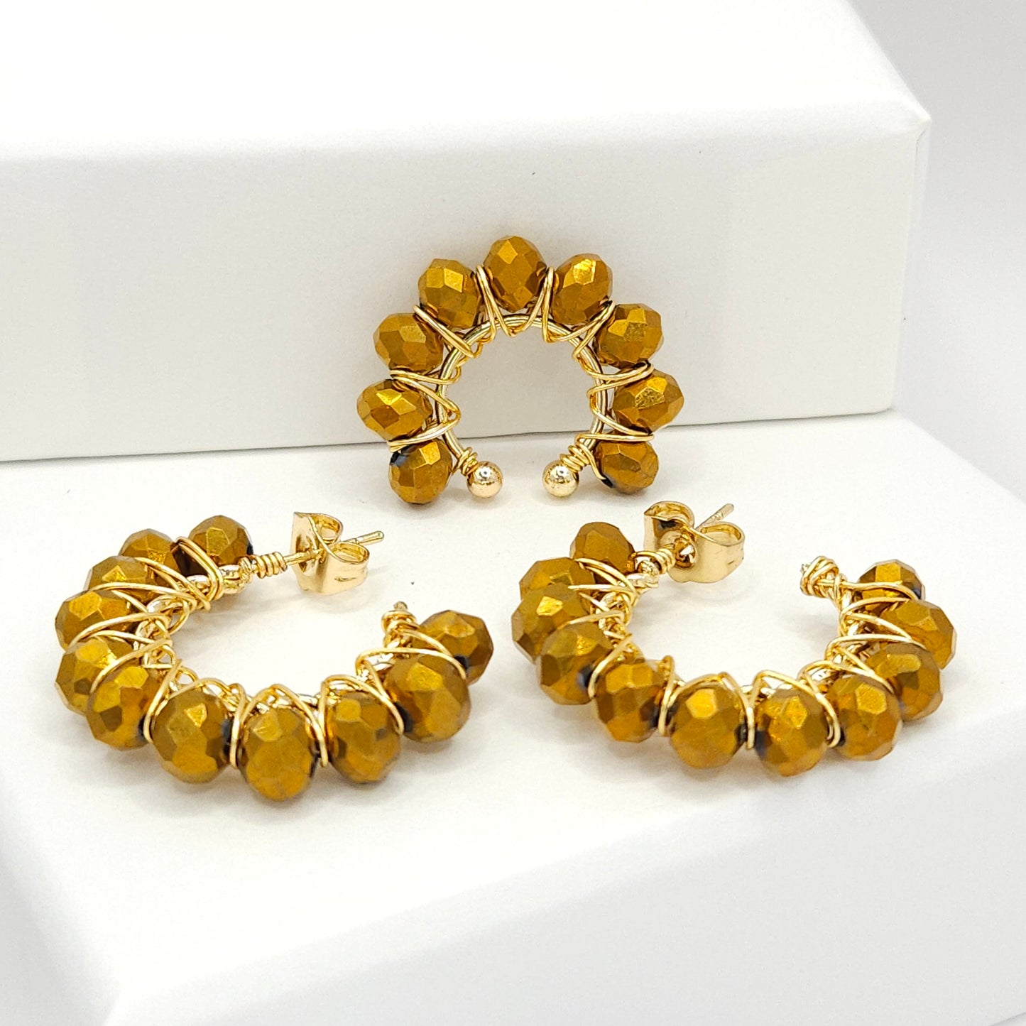 Golden pair of hoops and ear cuff with delicate chocolate faceted rondelle glass beads