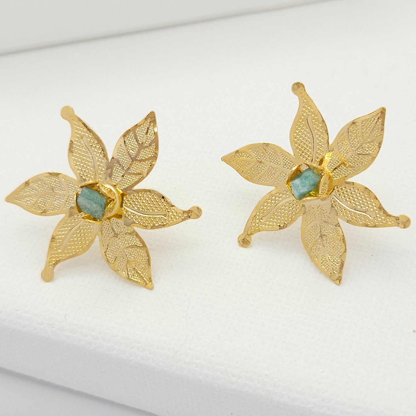Handmade wildflower statement earrings from luxurious 18k gold-plated bronze and Emerald murralla