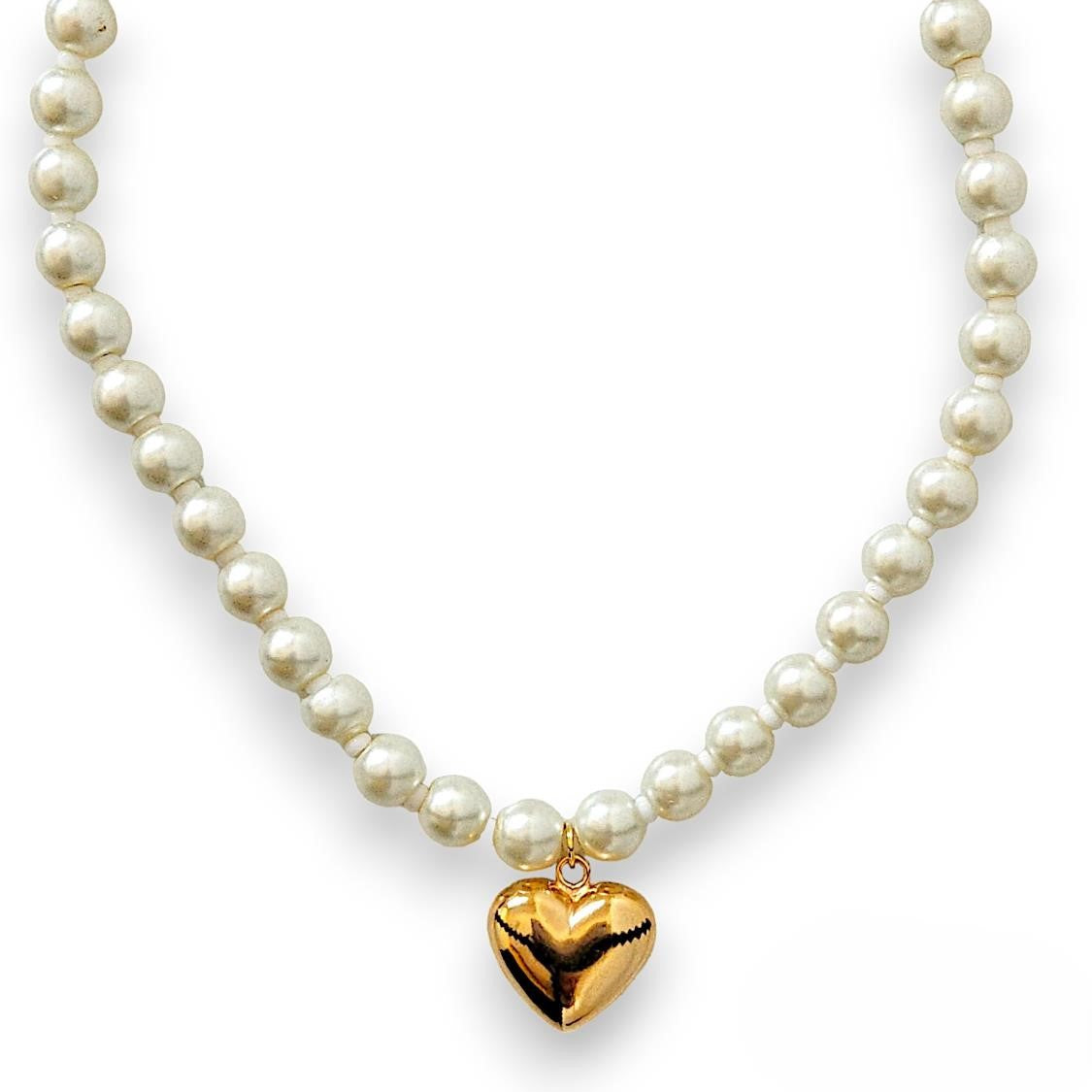 Handmade pearl necklace, adorned with a golden heart pendant