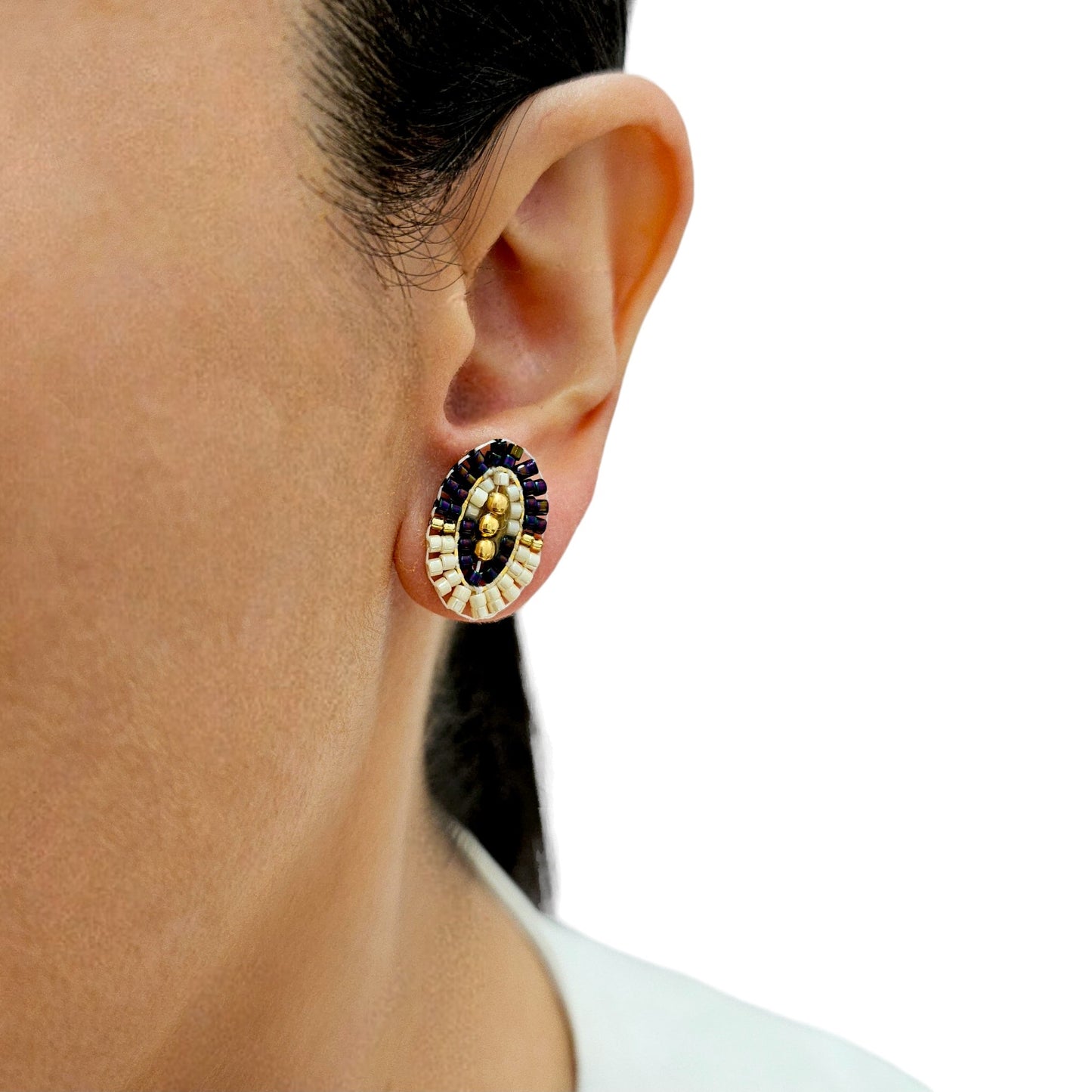 Oval-shaped stud earrings with purple and white Miyuki beads