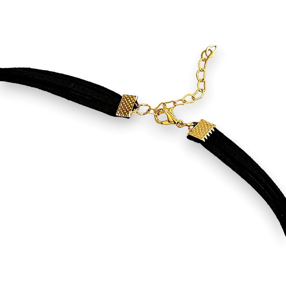 Handmade leather corded necklace suspending a puffed heart pendant and spring-ring closure