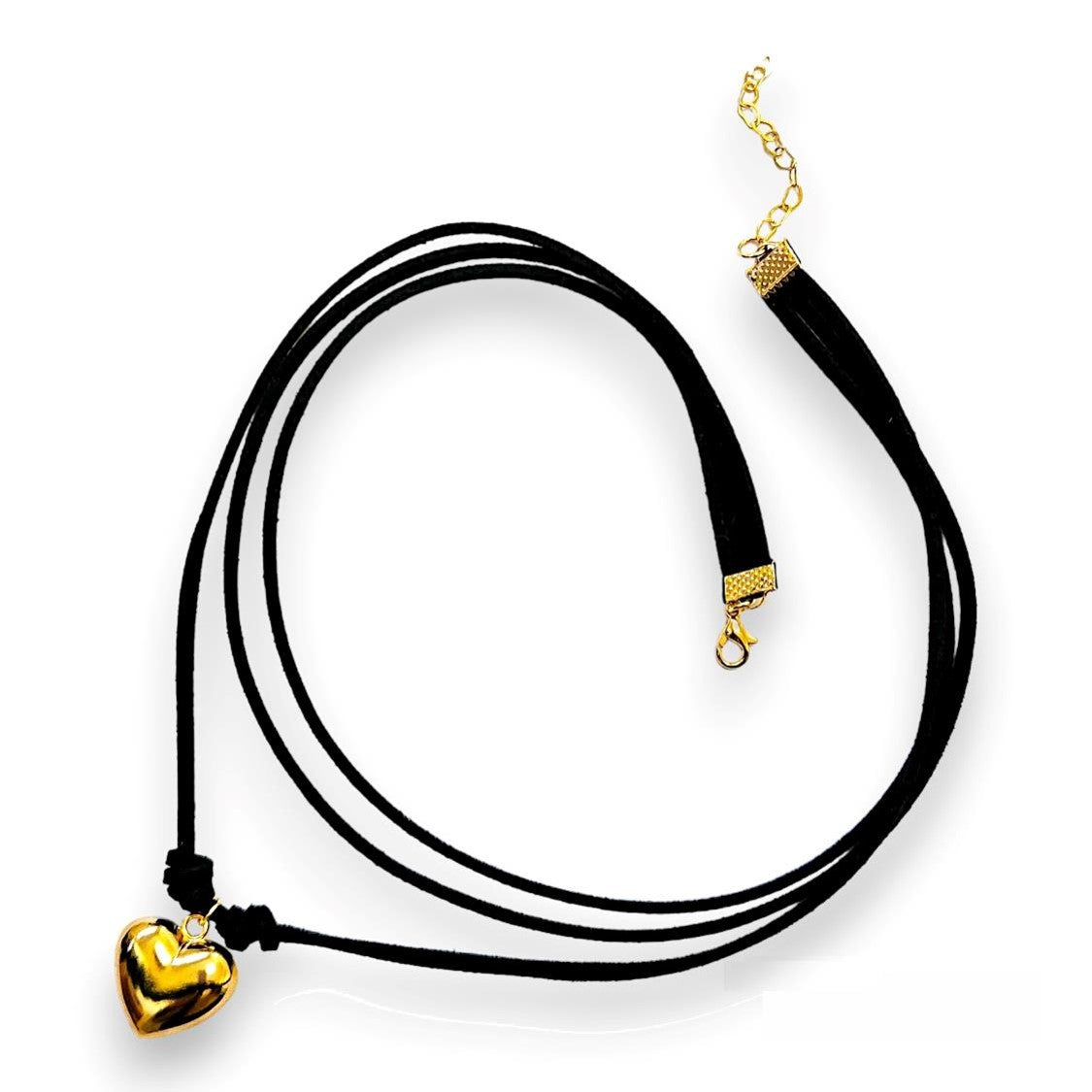 Handmade leather corded necklace suspending a puffed heart pendant