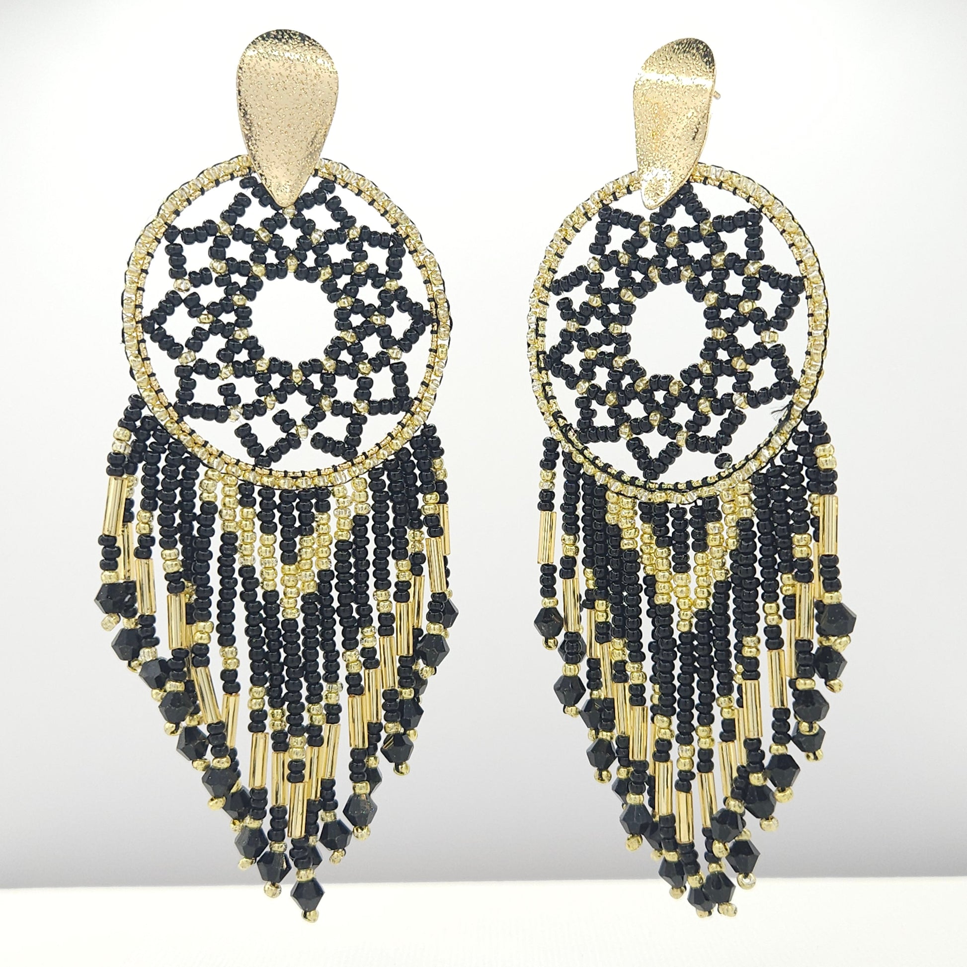 Handmade statement artisanal earrings made of Czech beads and Metal coated in a goldtone finish