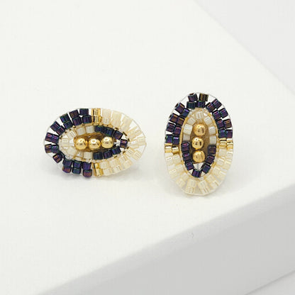 Oval-shaped stud earrings with purple and white Miyuki beads