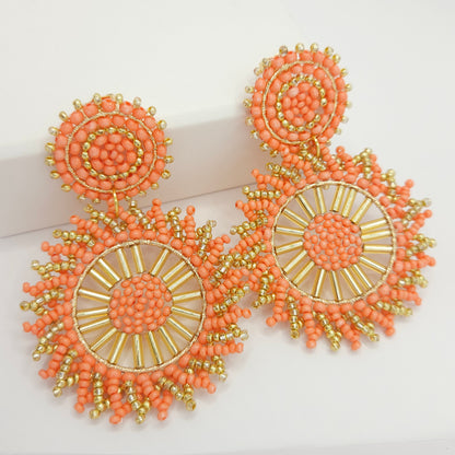 Flaming sun-shaped earrings made of Czech beads and Glass bugle beads