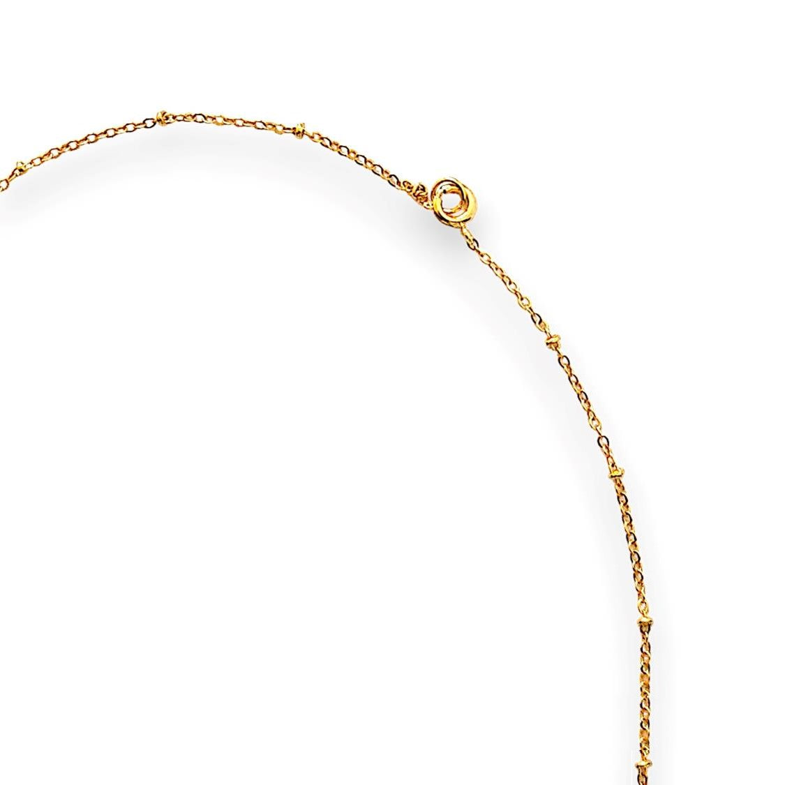 Handmade Star Pendant Necklace featuring a delicate chain adorned with small spheres in a gleaming goldtone and spring-ring closure